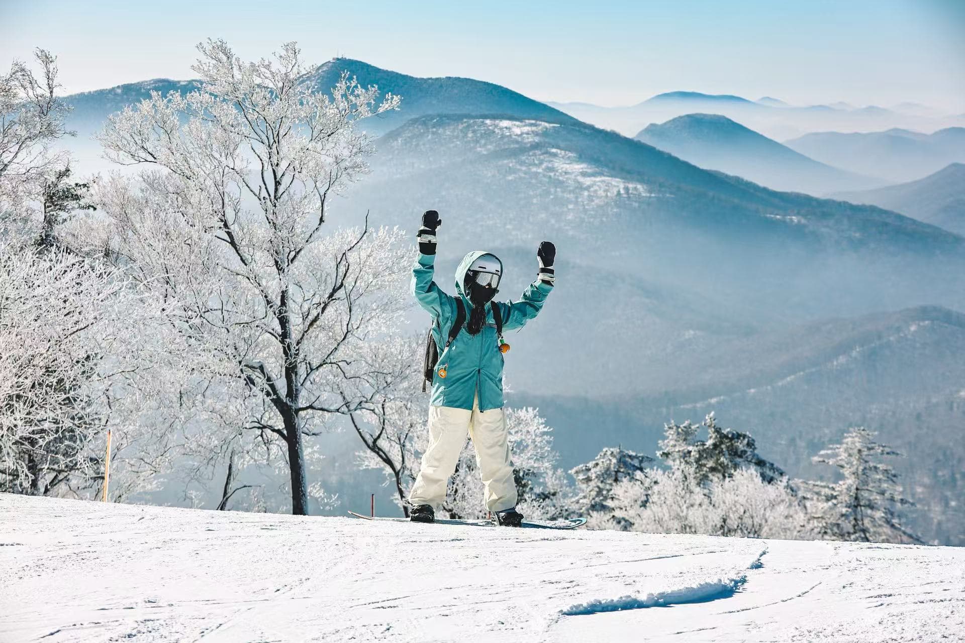 Skiers enjoying powder snow at Beidahu Ski Resort in China